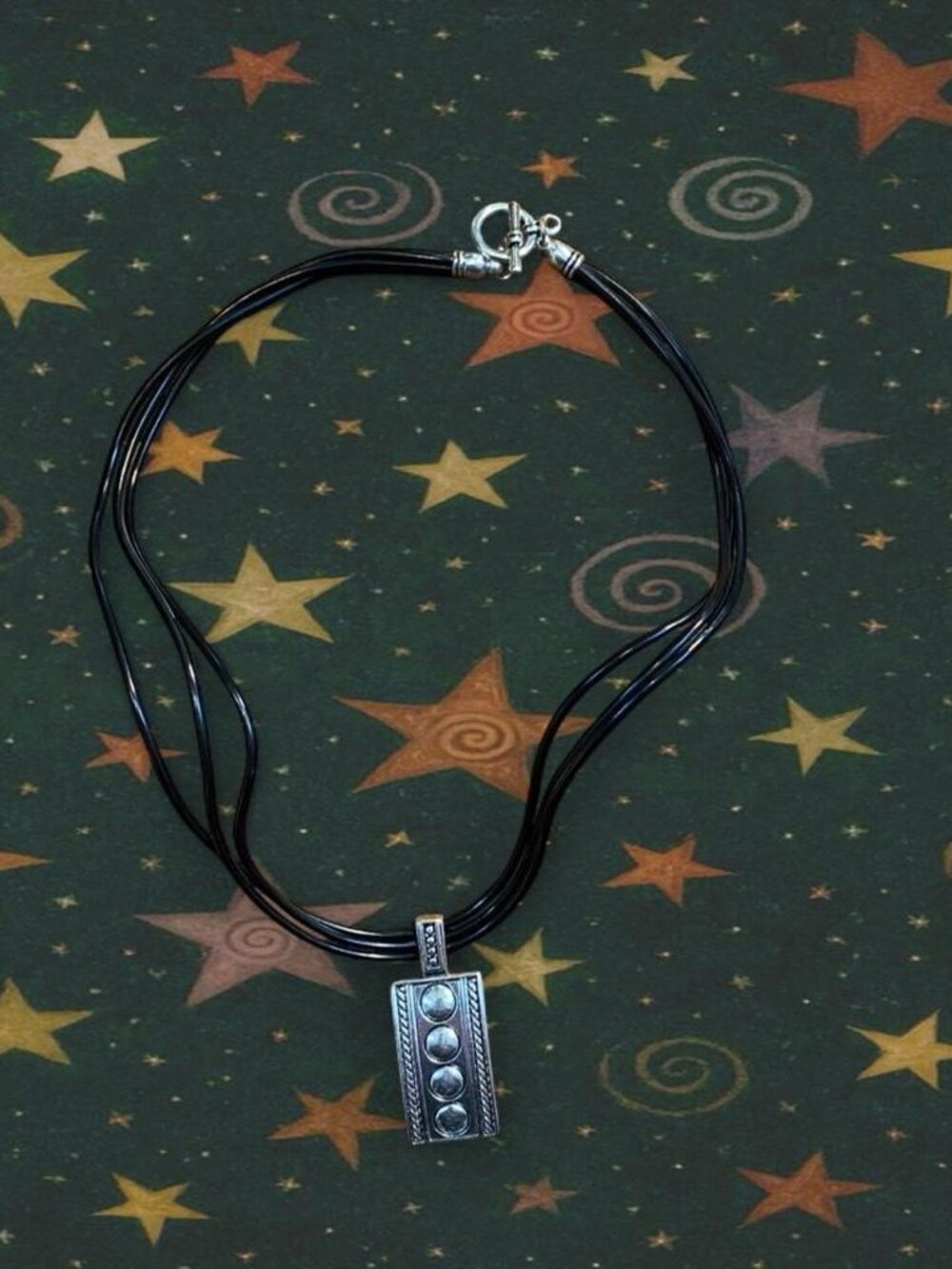 Funky silver pendant necklace.
